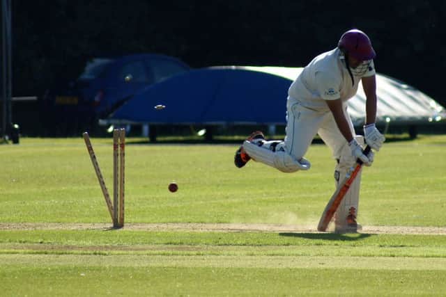 Preston Nomads batsman Kashif Ibrahim is bowled by Hastings Priory paceman Adam Barton. Picture courtesy Regwood Photography