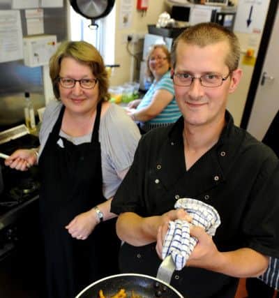 The team at The Empty Plate CafÃ© which is made up of volunteers. Picture: Steve Robards