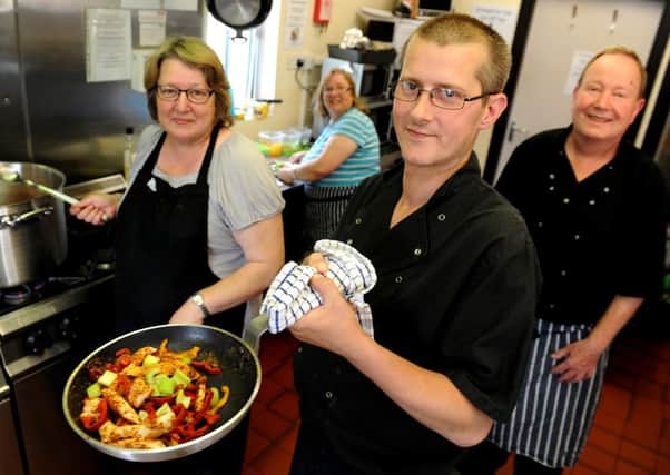 The team at The Empty Plate CafÃ© which is made up of volunteers. The cafÃ© makes its meals from food that would otherwise be thrown away by supermarkets. Picture: Steve Robards