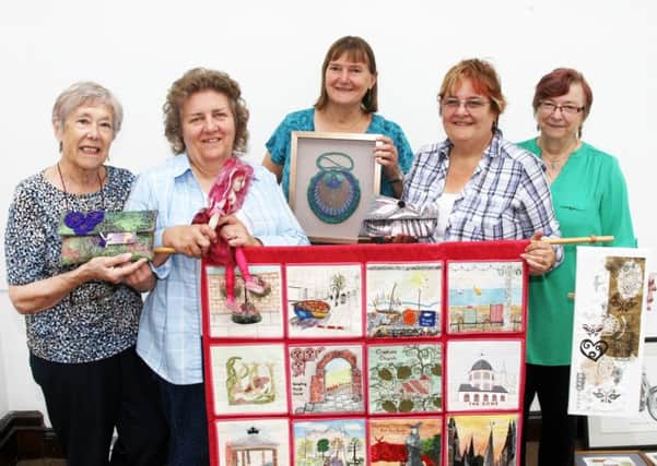 Worthing Embroiderers' Guild setting up their 40th anniversary exhibition. Picture: Derek Martin DM16129609a