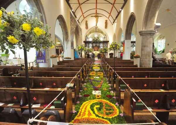 File picture, St Peter's is home to the annual flower festival SUS-140627-135259001