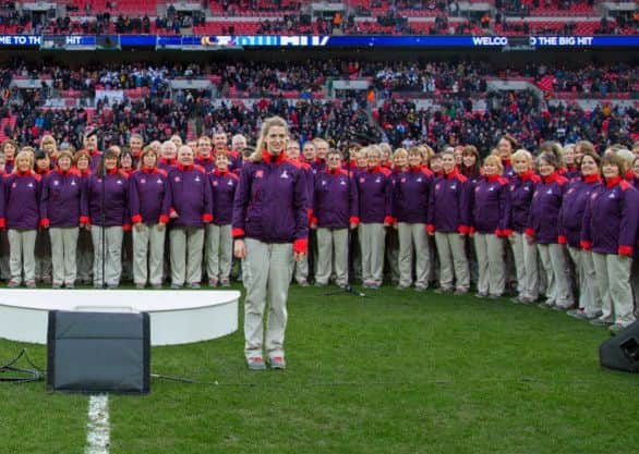 (Main picture) The choir at Wembley. (Below from left) Friends Julie Gilson, Jenny Hicklin and Margaret Murphy at the Rugby World Cup