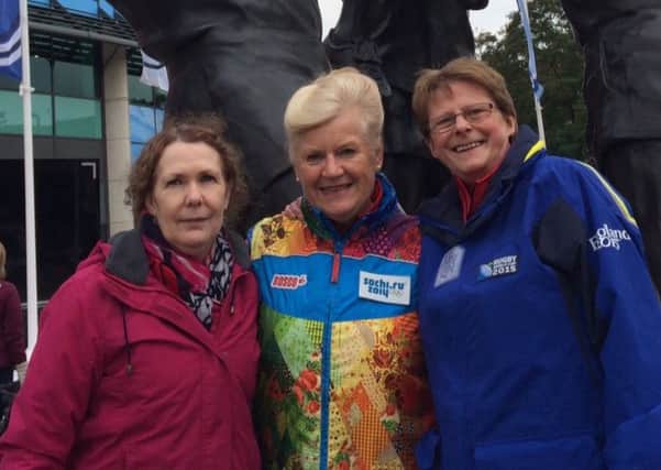 Bognor Regis friends, Margaret Murphy, Jenny Hicklin and Julie Gillson (from L - R) are part of the Games Maker Choir which is singing at the Rugby World Cup, and will sing in the final SUS-151027-135520001