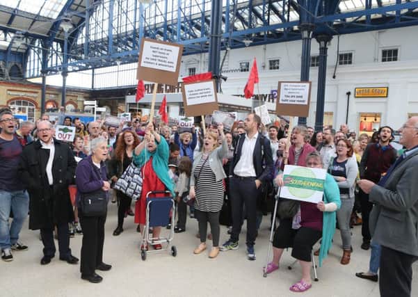 Passengers demonstrate at Brighton Station