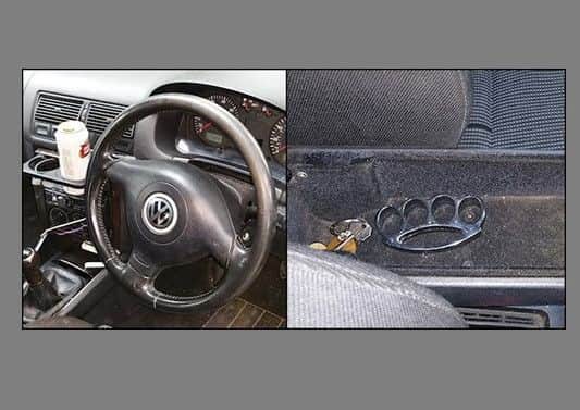 Can of Stella and a knuckle duster found in car. Photo by Sussex Police.