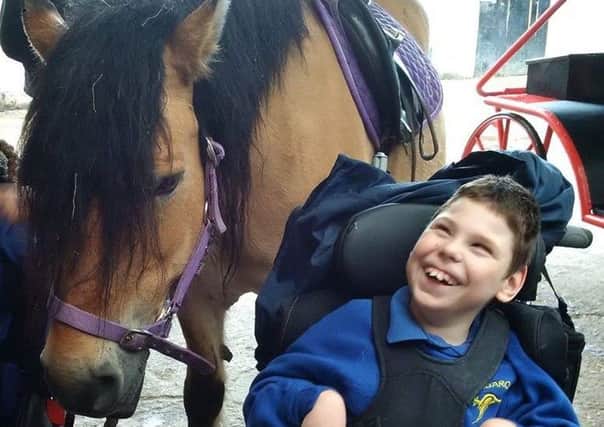 Noah Gee, from Haywards Heath, who has cerebral palsy SUS-160807-113405001