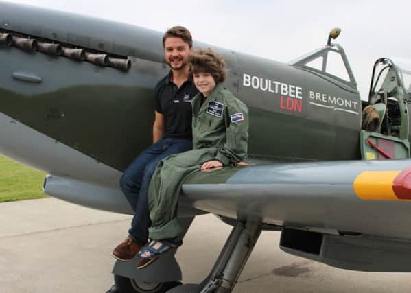 Rufus Knight, nine, with Charles Osborne, Boultbee Flight Academy, who has offered to fly Tim Peake to Chichester in the two seater Spitfire.