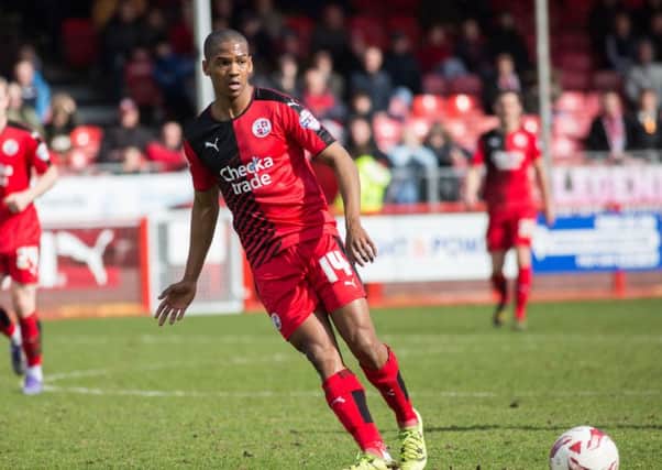 Lewis Young makes a pass for Crawley Town against Exeter City, 28th March 2016. (c) Jack Beard SUS-160328-171235008
