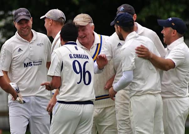 Broadwater are all smiles after taking a wicket in their five-wicket win at home to Arundel on Saturday