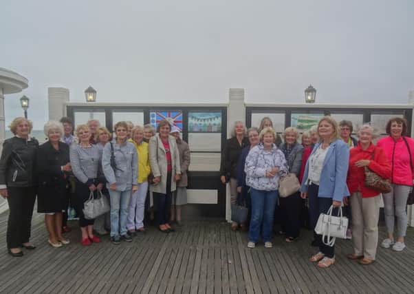 Members of Worthing's Women's Institute unveiled a commemorative plaque on the pier. Picture: Christine Hodges