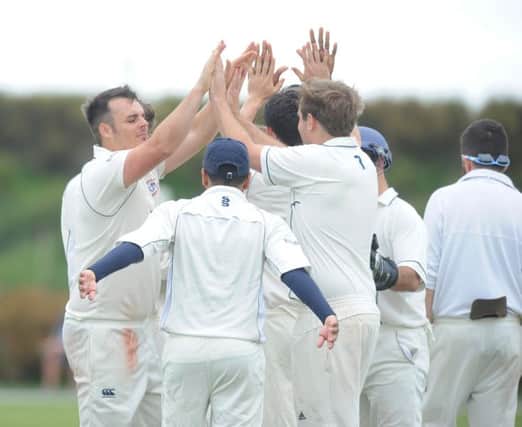 Seaford CC V Slinfold CC 9/7/16 Guy Thorne celebrates a wicket (Photo by Jon Rigby) SUS-161107-151827008