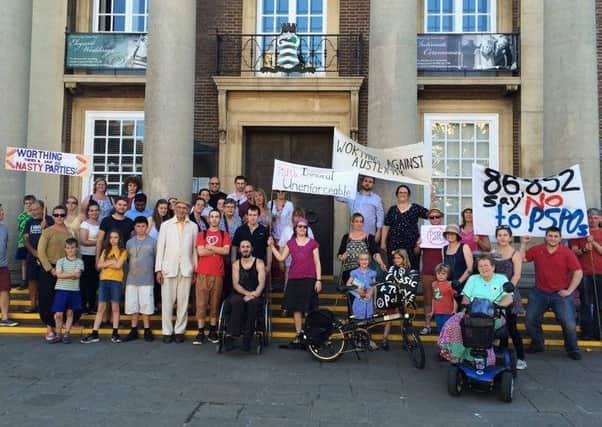 Protesters gather outside Worthing Town Hall over the implementation of Public Spaces Protection Orders (PSPOs) SUS-160720-090050001