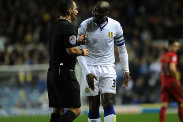 Leeds United v Blackburn Rovers.United's Sol  Bamba argues with referee Tim Robinson.29th October 2015.Picture : Jonathan Gawthorpe YPN-150111-150152061