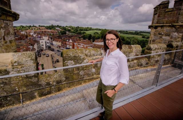 Sam Stones, Senior Properties Curator for English Heritage, stands on the new rooftop viewing platform, above the Great Gatehouse, where visitors can for the first time get a 360 degree perspective on the battlefield. Â© English Heritage SUS-160713-145351001
