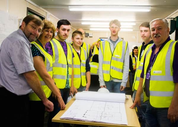 Crawley STEMfest event helps bring construction careers to life. Left to right: Mitch Woods, Site Manager, PMC Construction; Jacqueline Burton, Development Officer, Stonewater; Students Billy Crowe, Kane Hardman, Mitchell Masyln & Craig Robinson with Garry Blunt, Programme Area Manager for Construction Trades, Central Sussex College - picture submitted by Stonewater