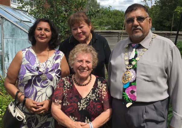 Fundraiser Maria Hains (third from left) hosted a garden party for the Crawley Hospital League of Friends. Pictured with Lorna Walton from Ifield Co-op and Crawley mayor Raj Sharma and his wife mayoress Bhavna - submitted