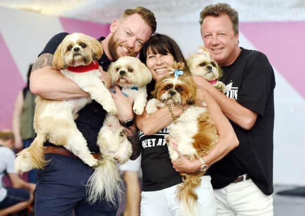 Shihtzu Fun Day at House of Hugo, Shoreham.

Pictured is L- R Leon Towers (Owner of Hugo's and Organiser), Maidy Coldham ( Shihtzu group leader and Organiser) with husband, Dean Coldham with Shihtzu's L-R Bruno, Charlie, Hugo and Coco Chanel.
Reporter: -
Picture: Liz Pearce 16/07/2016

LP1600161 SUS-160716-204641008