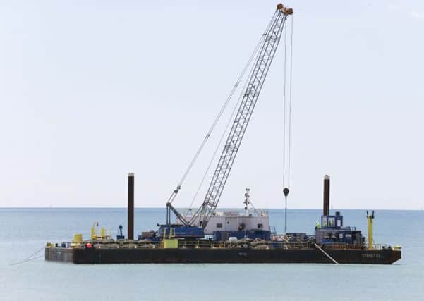 A barge has been seen off the Worthing coast, by Brooklands Golf Centre, as the Rampion Wind Farm project continues. Picture: Eddie Mitchell