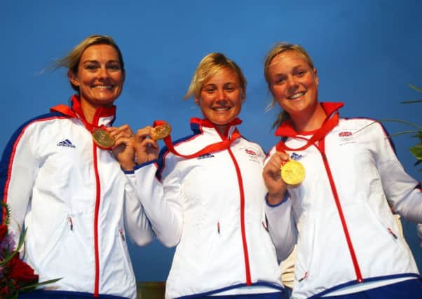 Sarah Ayton (centre), Sarah Webb (left) and Pippa Wilson (right) winning gold medal in the Yngling class.

Sailing at the Olympic Games, Qingdao, China, August 2008. Photo: Richard Langdon