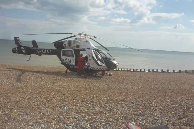 Air ambulance landing on St Leonards beach. Photo by Charlotte Howard. SUS-160714-174506001