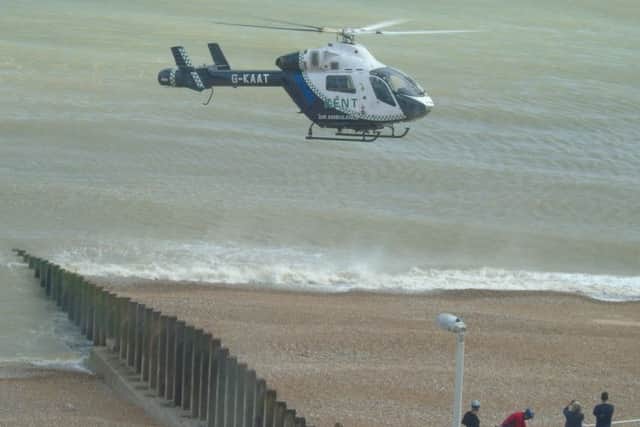 The Kent Air Ambulance lands on the beach by Marine Court. Picture by Paul Ashton. SUS-160714-175425001