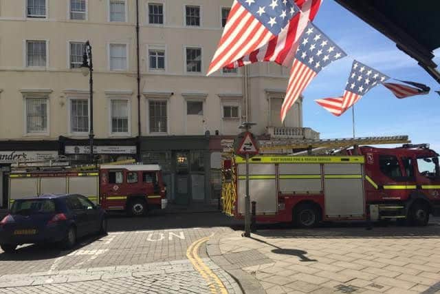 Firefighters in a training exercise on Hastings seafront. Photo by Jay Brewerton. SUS-160715-120616001