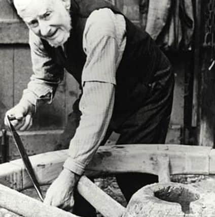 Mr Able Peirce, wheelwright and blacksmith. Alfred would watch him crafting carriage wheels in his workshop down The Slipe
