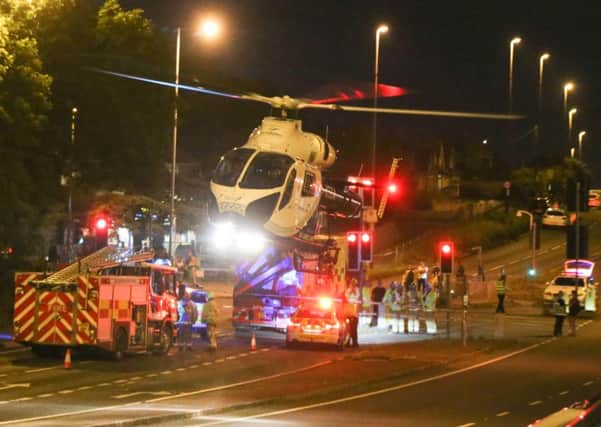 Emergency services at the scene of a road traffic collision on Saturday night. Picture: Eddie Mitchell