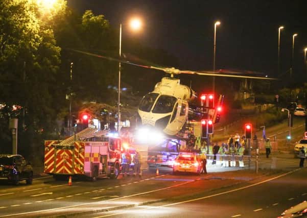 Emergency services at the scene of a road traffic collision last night. Picture: Eddie Mitchell