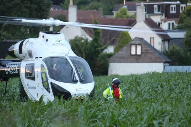 The air ambulance arrives at the scene of a road traffic collision last night. Picture: Eddie Mitchell