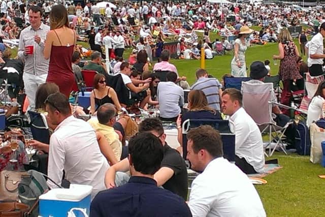 Thouands of picnickers enjoy the sunshine at the Gold Cup