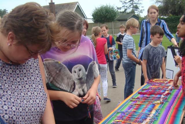 Colourful friendship bracelets, hand made by the pupils