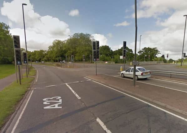 Traffic lights on the A23 at the junction with Ifield Community College (photo from Google Maps Street View). SUS-160718-102233001