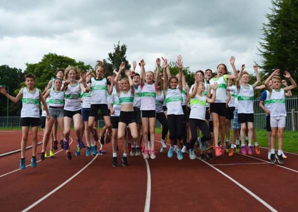 Chichester's under-13s and under-15s jump for joy / Picture by Lee Hollyer