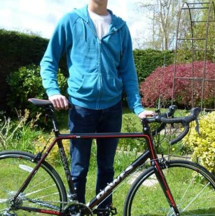 Adam Brombley with the bike given to him by Cyclists Fighting Cancer that was stolen at Emsworth station last week.