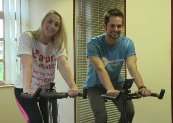 Colleagues from Arun Estates will take on a static cycle in Horsham in aid of two charities SUS-160808-112839001