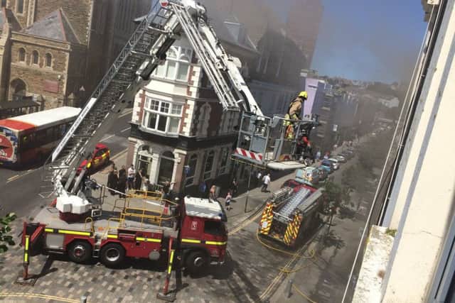 Firefighters tackling the fire at Spa on Kings Road, St Leonards. Photo by Tammi Cornford