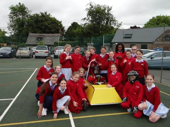 Year Six pupils at The Towers Convent School with a Goblin car