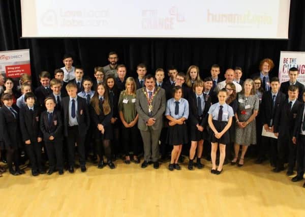 Bexhill Academy students, teachers, mayor Simon Elford, and representatives from Hastings Direct, LoveLocalJobs.com and humanutopia at the Be the Change graduation. Photo courtesy of Hastings Direct