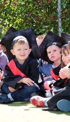 Children graduation from Cooperative Childcare nursery at  St Richards Hospital in Chichester