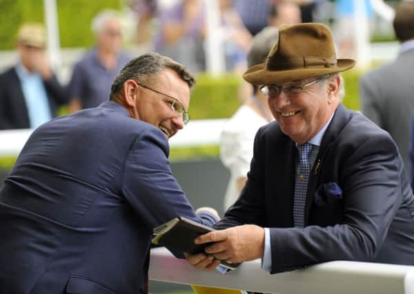 Seamus Buckley shares a joke with Goodwood's MD of sport Adam Waterworth / Picture by Malcolm Wells