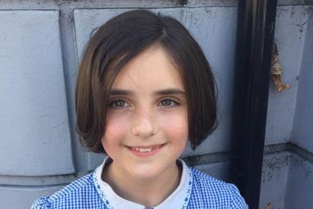 Imogen Nelson, 9, has followed in big sister Ciara's footsteps and had her hair cut for the Little Princess Trust Cz2L5dBaUmqa45U-rdjp