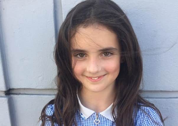 Imogen Nelson, 9, has followed in big sister Ciara's footsteps and had her hair cut for the Little Princess Trust 6XNo5htU0X9MtX1YKdOQ
