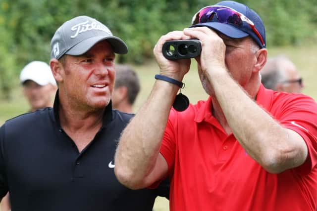 DM16130142a.jpg Sir Ian Botham and Shane Warne at Mannings Heath Golf Club. Photo by Derek Martin SUS-160721-172343008
