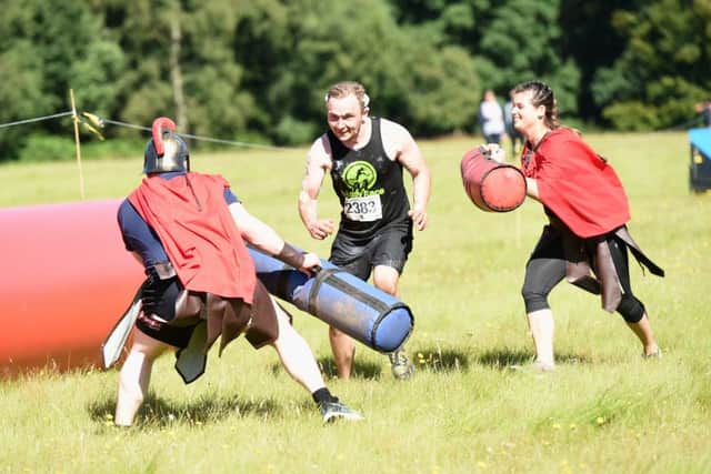 Gauntlet Games for Home Start CHAMS. 

5km obstacle race for charity. 
Pictured is Ethan Tait coming in first.
Handcross, West Sussex.

Picture: Liz Pearce. 06/08/2016
LP1600354 SUS-160608-194140008