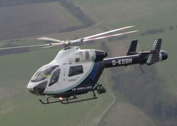 kent surrey and sussex air ambulance stock picture SUS-141205-123830001