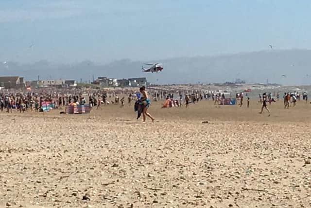 The Coastguard helicopter at Camber Sands. Photo by Philip Smith SUS-160724-135400001
