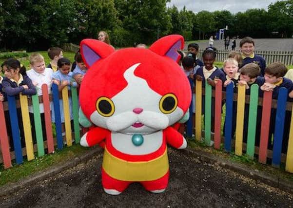 Chris McGivern, a teacher at Southgate Primary is using characters from the Japanese phenomenon and Nintendo 3DS game YO-KAI WATCH to help broach serious issues with his pupils - picture submitted