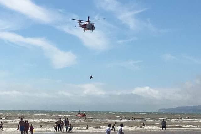 The Coastguard helicopter at Camber Sands. Photo by Jo O'brien-Passfield SUS-160724-173739001