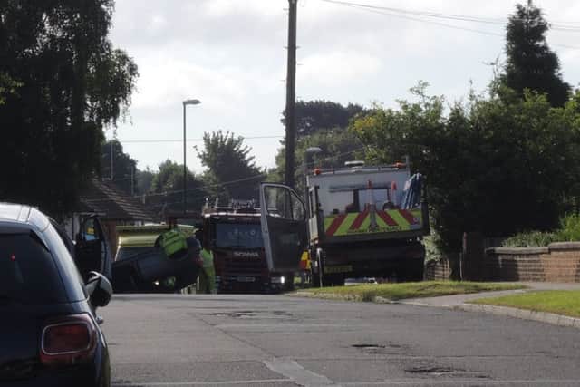 Three-car collision in Horsham